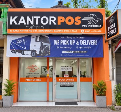 The Pos With Us shopfront on Jl. Raya Anyar, under a large orange Kantor Pos sign